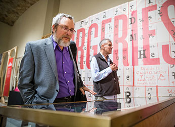 Photo of a man looking at a display. Link to Life Stage Gift Planner Ages 60-70 Situations.