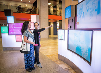 Photo of women looking at a display. Link to Life Stage Gift Planner Under Age 60 Situations.